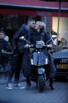 Amsterdam 14 maart 2018 
Caroline Tensen met zoon Bob Wisse en haar hondje op de vespa scooter