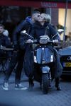 Amsterdam 14 maart 2018 
Caroline Tensen met zoon Bob Wisse en haar hondje op de vespa scooter