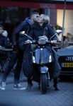 Amsterdam 14 maart 2018 
Caroline Tensen met zoon Bob Wisse en haar hondje op de vespa scooter