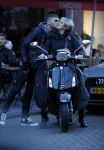 Amsterdam 14 maart 2018 
Caroline Tensen met zoon Bob Wisse en haar hondje op de vespa scooter