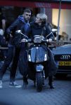 Amsterdam 14 maart 2018 
Caroline Tensen met zoon Bob Wisse en haar hondje op de vespa scooter