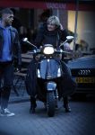 Amsterdam 14 maart 2018 
Caroline Tensen met zoon Bob Wisse en haar hondje op de vespa scooter