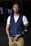 Amsterdam 15 maart 2018  
Presentatie kledinglijn Remy Bonjasky. Charly Luske met zijn arm in een brace na ongeluk met snowboard