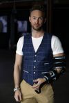 Amsterdam 15 maart 2018  
Presentatie kledinglijn Remy Bonjasky. Charly Luske met zijn arm in een brace na ongeluk met snowboard