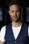 Amsterdam 15 maart 2018  
Presentatie kledinglijn Remy Bonjasky. Charly Luske met zijn arm in een brace na ongeluk met snowboard
