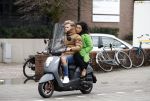Amsterdam, 16 Maart 2019
Moise Trustfull met vriend op de scooter