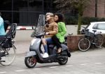 Amsterdam, 16 Maart 2019
Moise Trustfull met vriend op de scooter
