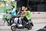 Amsterdam, 16 Maart 2019
Moise Trustfull met vriend op de scooter