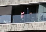 Amsterdam 25 maart 2021
Bilal Wahib rookt sigaret op zijn balkon van zijn appartement