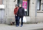 Amsterdam 15 april 2023
Gerard Spong met partner en hondje op straat in Amsterdam zuid.