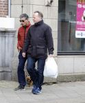 Amsterdam 15 april 2023
Gerard Spong met partner en hondje op straat in Amsterdam zuid.
