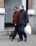 Amsterdam 15 april 2023
Gerard Spong met partner en hondje op straat in Amsterdam zuid.