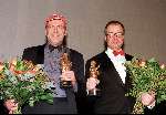 07 April 1999  Grolsch Master premiere
Links Berney Bos en Ben Sombogaart krijgen een 
