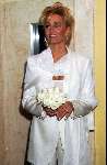 15 April 1999
Natasja Froger voor haar tweede huwelijk met Rene Froger komend vanuit de lift