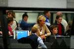 Schiphol  26 april 2003
Caroline Tensen vertrekt met dochter lotte en zoontje bob
naar turkije