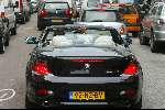 Amsterdam 2 april 2004
Gordon en Christine Kroonenberg op pc hooftstraat in bmw 645 CI Cabrio