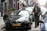 Amsterdam 2 april 2004
Gordon en Christine Kroonenberg op pc hooftstraat in bmw 645 CI Cabrio