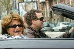 Amsterdam 2 april 2004
Gordon en Christine Kroonenberg op pc hooftstraat in bmw 645 CI Cabrio
