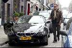 Amsterdam 2 april 2004
Gordon en Christine Kroonenberg op pc hooftstraat in bmw 645 CI Cabrio