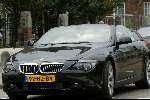 Amsterdam 2 april 2004
Gordon en Christine Kroonenberg op pc hooftstraat in bmw 645 CI Cabrio