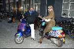 Amsterdam 1 april 2004
Feestje Patty Brard  in de zebra lounge.
Henk Schiffmacher met vrouw op de scooter