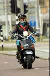 Amsterdam 9 april 2004
Manuela Kemp op scooter in Amsterdam