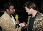 Hilversum 1 april 2005
Afscheidsfeestje van Beau v Erven Dorens. 
John Williams met  Beau en champagne