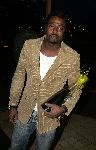 Hilversum 1 april 2005
Afscheidsfeestje van Beau v Erven Dorens. John Williams met champagne
