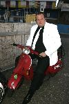 Amsterdam 11 april 2005
Feest op supperclub boot.
Menno Kohler op vespa scooter met vriendin