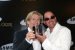 Amsterdam, 12 Juli 2006
Presentatie nieuw GSM Toestel type van Samsung X820 i.s.m. met Oger.  Addy v d Krommenacker met zijn vriend
