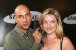 Amsterdam, 12 Juli 2006
Presentatie nieuw GSM Toestel type van Samsung X820 i.s.m. met Oger.  Anniek Pheifer met Youssef Idilbi