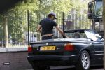 Amsterdam 23 juli 2006
Dinand Woesthof in bmw cabrio met tatoo