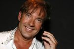 Rotterdam 28 juni 2006
Miss femmefone in de Jackie in rotterdam. Gerard Joling met gsm
PeterSmulders bv