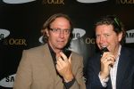 Amsterdam, 12 Juli 2006
Presentatie nieuw GSM Toestel type van Samsung X820 i.s.m. met Oger.  Henkjan Smits samen met Eric v Tijn