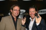 Amsterdam, 12 Juli 2006
Presentatie nieuw GSM Toestel type van Samsung X820 i.s.m. met Oger.  Henkjan Smits samen met Eric v Tijn