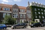 Amsterdam 14 juli 2006
Huis Jack Spijkerman met naast hem een huis  dat vorige week van binnen uitgebrand is