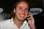 Amsterdam, 12 Juli 2006
Presentatie nieuw GSM Toestel type van Samsung X820 i.s.m. met Oger.  John Ewbank