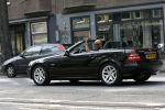 Amsterdam 16 augustus 2006
maik de Boer in zijn mercedes cabrio