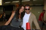 Schiphol 4 juni 2006
Mariska Hulscher en haar man Arie Schouwenaar arriveren een dag na hun trouwerij op schiphol met hun kinderen.
Peter Smulders bv
