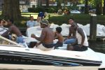 Amsterdam, 12 Juli 2006 Amsterdamse grachten.
Patrick Kluivert met zijn kinderen en familie en vrienden niet voetballend in Valencia maar varend op een speed boot