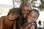 Ibiza 27 juli 2006
 Patty Brard en Joelle Gullit en Justin Kluivert  op Ibiza.