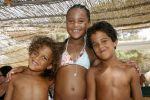 Ibiza 27 juli 2006
Joelle Gullit   en Justin Kluivert en Ruben Kluivert op Ibiza.
