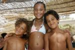 Ibiza 27 juli 2006
Joelle Gullit   en Justin Kluivert en Ruben Kluivert op Ibiza.