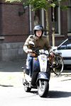 Amsterdam 31 juli 2007
Cas jansen op scooter in amsterdam.