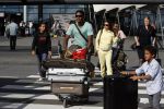 Schiphol 29 juli 2007
Patrick Kluivert en zij zwangere vriendin Rossana Lima komen terug met hun kinderen van vakantie op ibiza.
