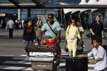 Schiphol 29 juli 2007
Patrick Kluivert en zij zwangere vriendin Rossana Lima komen terug met hun kindreen van vakantie op ibiza.