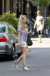 Amsterdam 10 juli 2010
Candy Dulfer doet boodschappen met haar Porsche Caymann
Peter Smulders bv