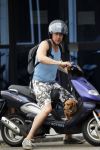 Amsterdam 3 juli 2010
Hans Kesting met zijn hond op een scooter.Hans heeft grote Tatoo
Peter Smulders bv