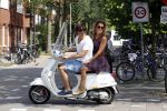 Amsterdam 1 augustus 2011
Tatum dagelet en haar vriend Daniel de Ridder op vespa scooter.
Peter Smulders bv