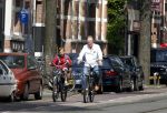 Amsterdam 5 juni 2011
Jack Spijkerman met zoon op fiets.
Peter Smulders bv
